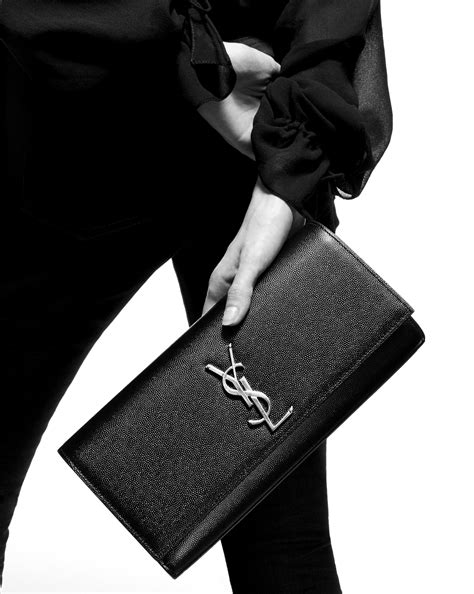 Shop Saint Laurent Kate Clutch with Tassel in Shiny Leather.